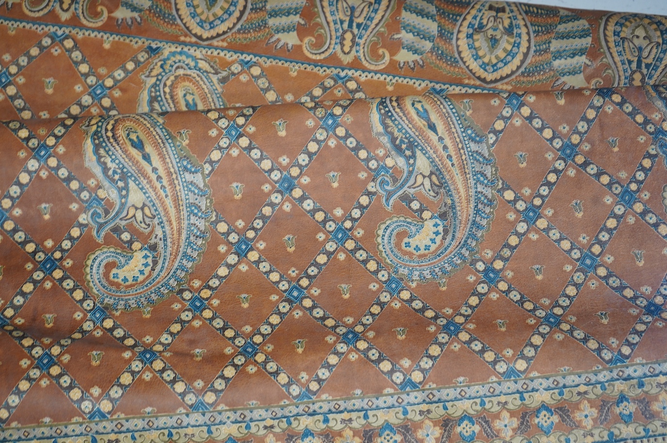 Three leather hides with printed boteh pattern decoration. Condition -fair